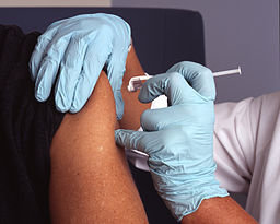 256px nurse administers a vaccine